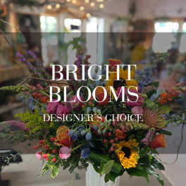 Colorful mixed flower arrangement with large text overlay