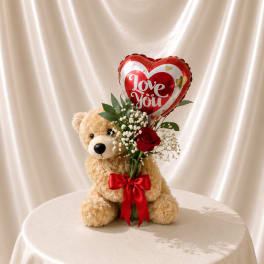 Teddy bear with a heart balloon and red rose bouquet