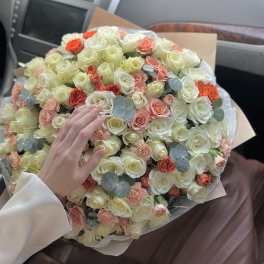 Bouquet of mixed warm-colored roses.