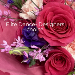 Mixed bouquet of red roses, peach carnations, and purple flowers wrapped in pink paper