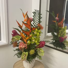 Tall and airy arrangement in a basket