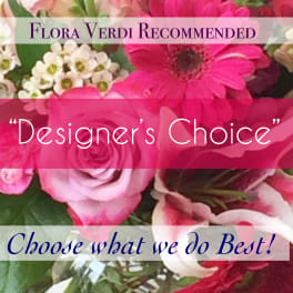 Pink roses and gerbera daisies with white filler flowers