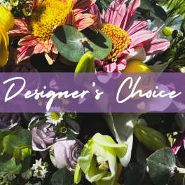 Mixed bouquet with pink daisies, lilies, and pale roses