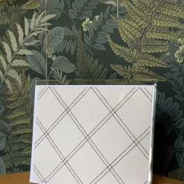 Blank plaid greeting card in a clear plastic sleeve