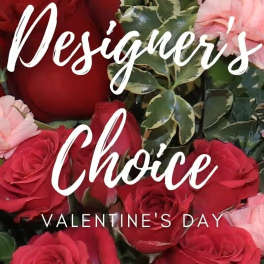 Red and pink roses with variegated greenery and Valentine’s Day text