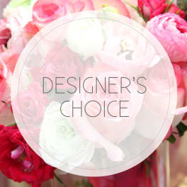 Pink and white rose bouquet with a "Designer’s Choice" overlay