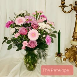 Pink and white mixed bouquet in a glass vase