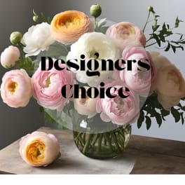 Bouquet of pastel ranunculus in a glass vase
