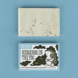 Two chocolate bars on a blue background, one in a labeled box