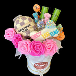 Pink rose bouquet with a dog-themed gift arrangement in a white box