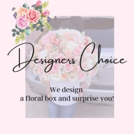 Pastel pink and white rose bouquet in a white box
