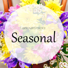 Colorful mixed bouquet with yellow, purple, and pink flowers