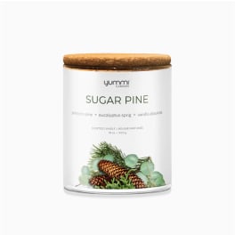 Scented candle in a glass jar with a wooden lid