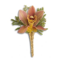 Pink orchid boutonniere with yellow accents and greenery