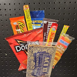 Assorted snack gift basket with candy and chips