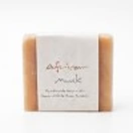 White boxed gift set with two amber candles