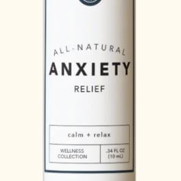 Small amber bottle labeled anxiety relief with a black cap