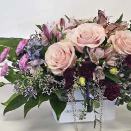 Beautiful arrangement in the paper bag