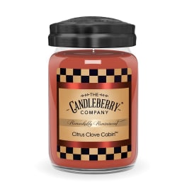 Jar candle with a black lid and red wax
