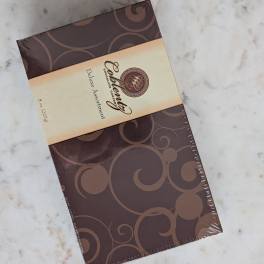 Box of assorted chocolates on a marble surface