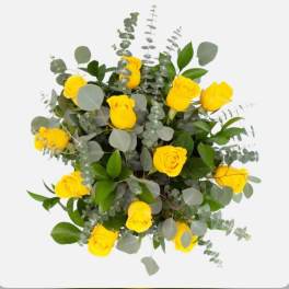 Yellow roses with eucalyptus greenery on a white background