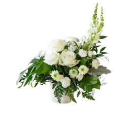 White rose and chrysanthemum arrangement in a white vase