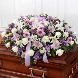 White and lavender casket arrangement