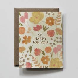 Floral greeting card with "So Happy For You" text on a brown envelope