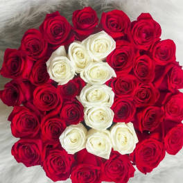 Round bouquet of red and white roses