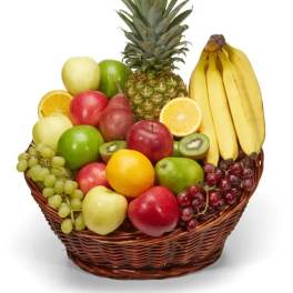 Fruit basket with pineapple, bananas, apples, grapes, oranges, and kiwi