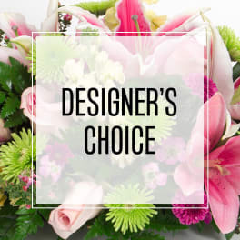 Mixed pink and white floral arrangement with designer's choice text overlay