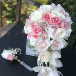 Pink and white bouquet with orchids and roses