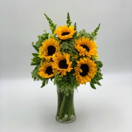 Sunflower bouquet in a clear glass vase