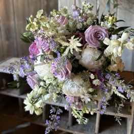 Bouquet of lavender and white flowers with airy filler blooms