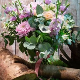 Pastel bouquet with pink, lavender, and cream flowers