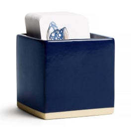 Blue ceramic container holding a stack of cards