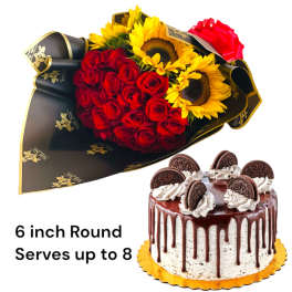 Bouquet of red roses and sunflowers beside a decorated cake