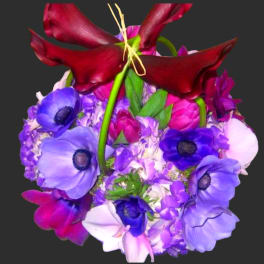 Bouquet of purple and red flowers with large calla lilies