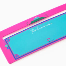 Pink and turquoise rectangular card with decorative border and text