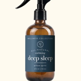 Amber spray bottle labeled deep sleep pillow spritz