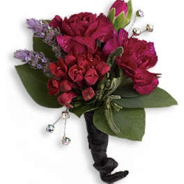 Magenta boutonniere with purple accents and dangling crystal pins