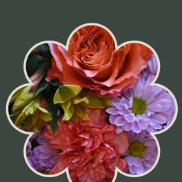 Flower-shaped frame filled with pink and purple blooms