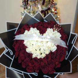 Bouquet of red and white roses with a Happy Birthday ribbon