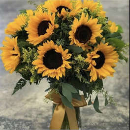 Bouquet of sunflowers with a gold ribbon