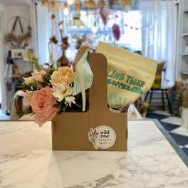 Small flower gift box with pink and white blooms and a coffee bag
