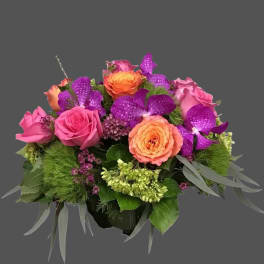 Bouquet of pink and orange roses with purple orchids