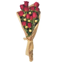 Bouquet of red roses wrapped in brown paper with gold accents