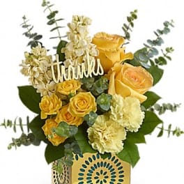 Yellow roses and cream flowers in a decorative box with a "thanks" sign