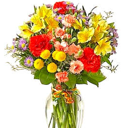 Colorful mixed bouquet in a clear glass vase