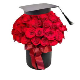Red rose bouquet in a black box with a graduation cap topper